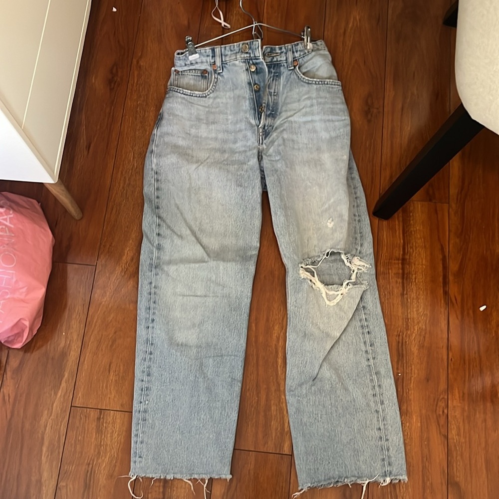Zara distressed light wash jeans.